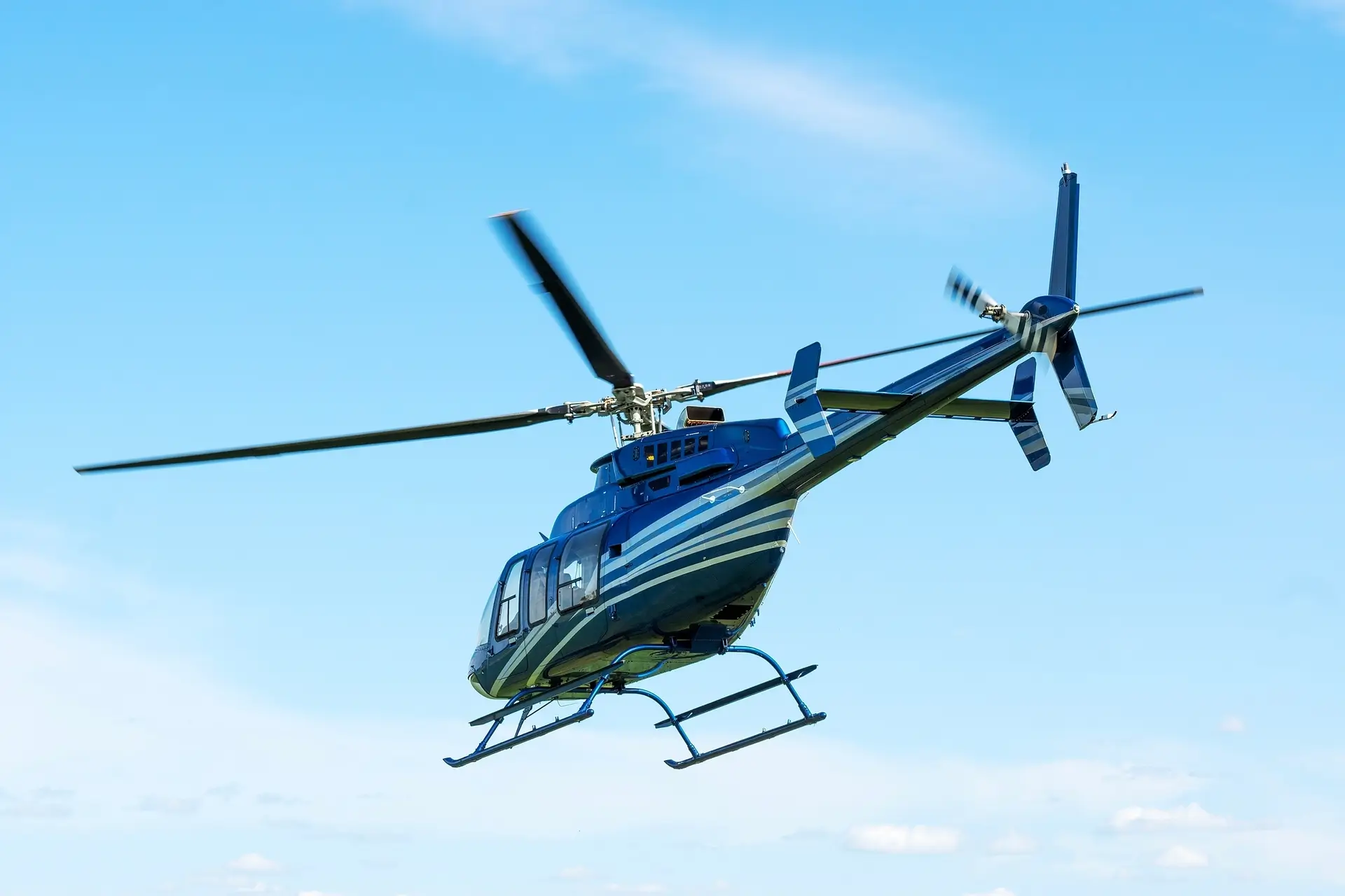 blue helicopter flying